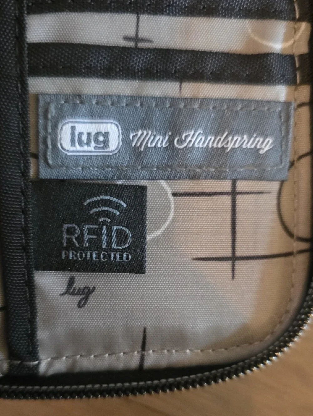 lug Black Mini Handspring RFID Quilted Zip Wallet with Logo Plaque